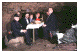 photo of a formal dress dinner in a cave